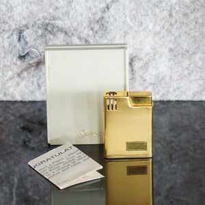 Collectible Vintage Gold Toned Piezoelectric Butane Lighter from SCRIPTO. Made in Japan.