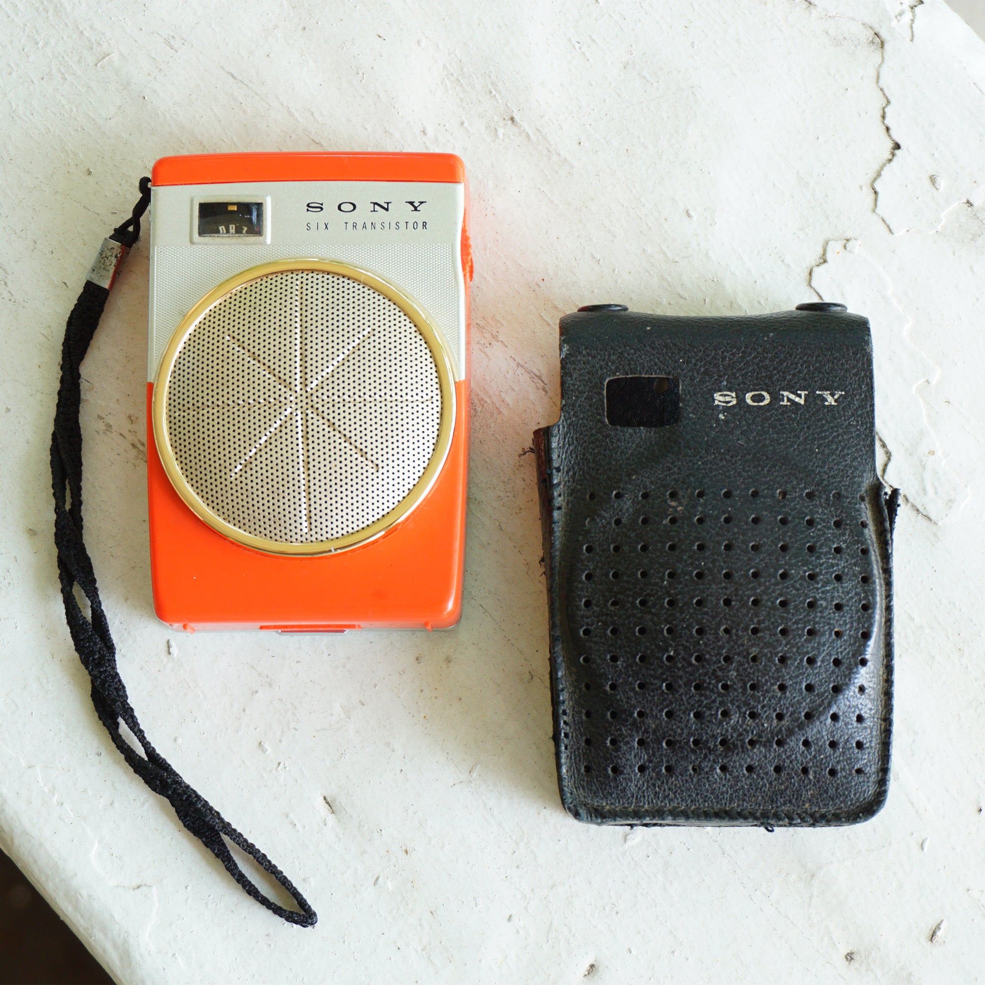 1960s Rare Vintage SONY Six Transistor Orange Pocket Radio with Leather Case. Model: TR-620. Made in Japan.