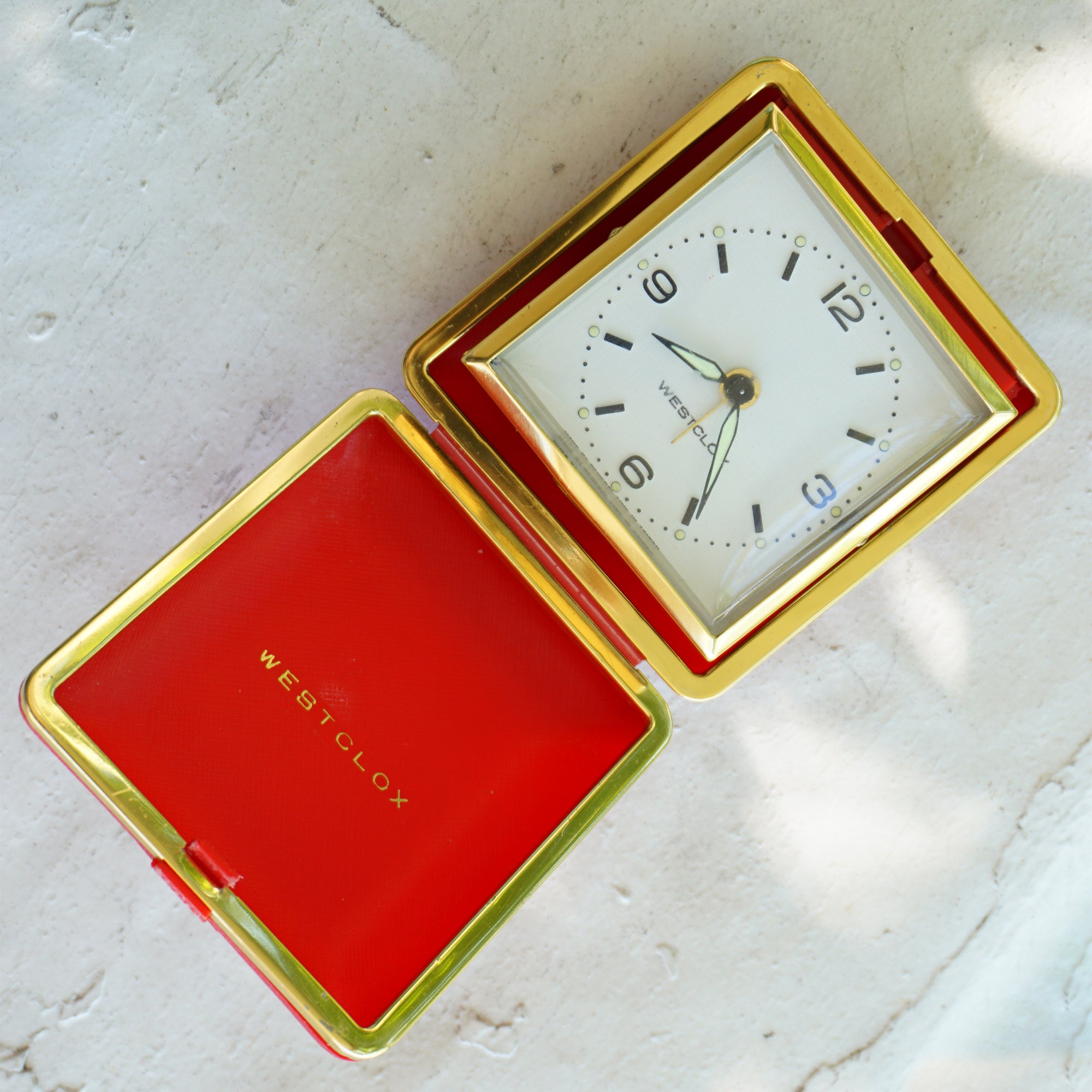 Vintage WESTCLOX Gold Tone Mechanical Travel Alarm Clock in Red Case. Made by General Time in Taiwan.