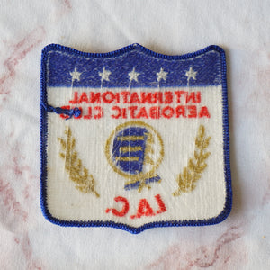 1980s Vintage 3.75" International Aerobatic Club I.A.C. Clothing Patch. Blue, Red, Metallic Gold and White Colors.
