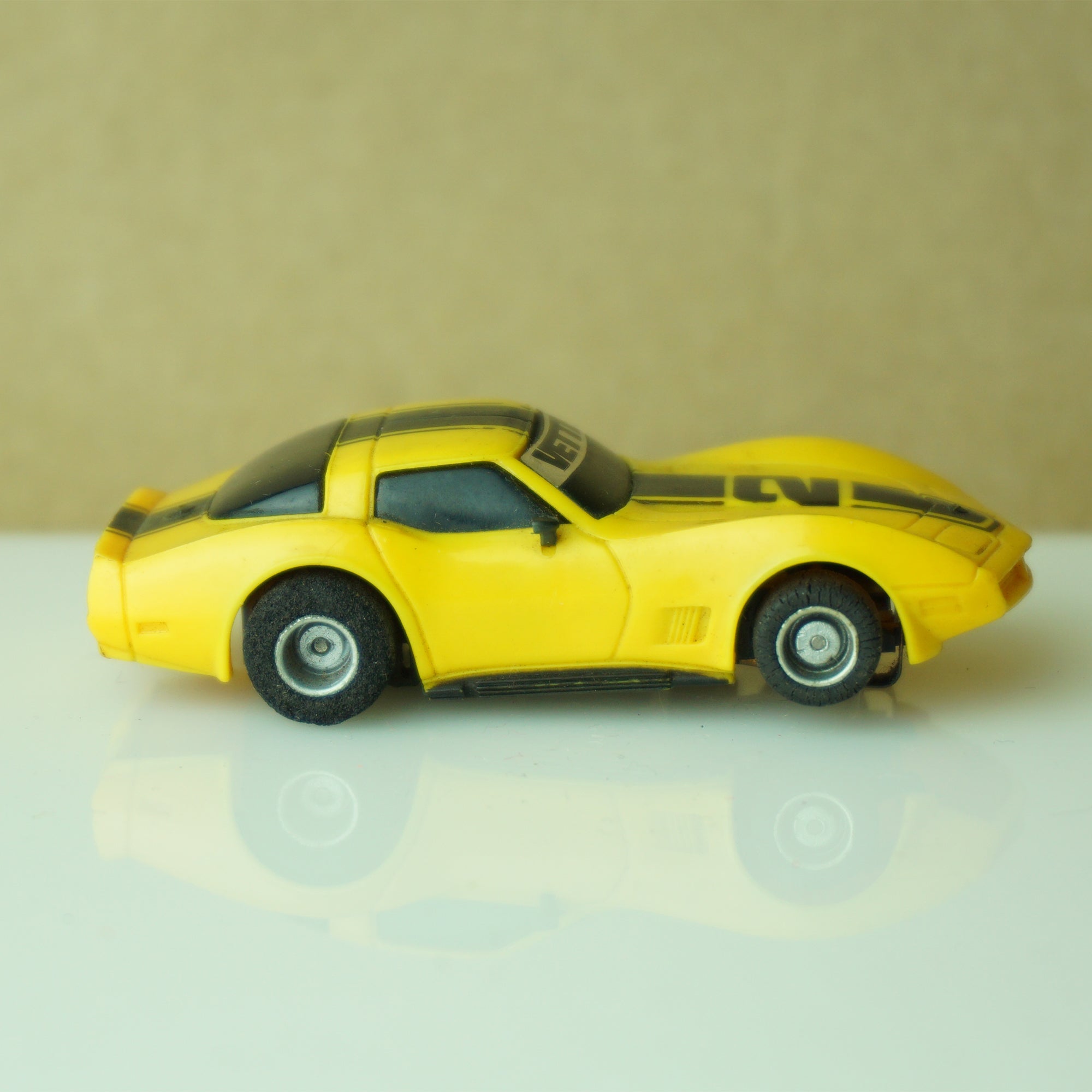 1981–1982 Vintage TYCO 1979 Chevy Corvette #2 Stripes Yellow and Black Slot Car.