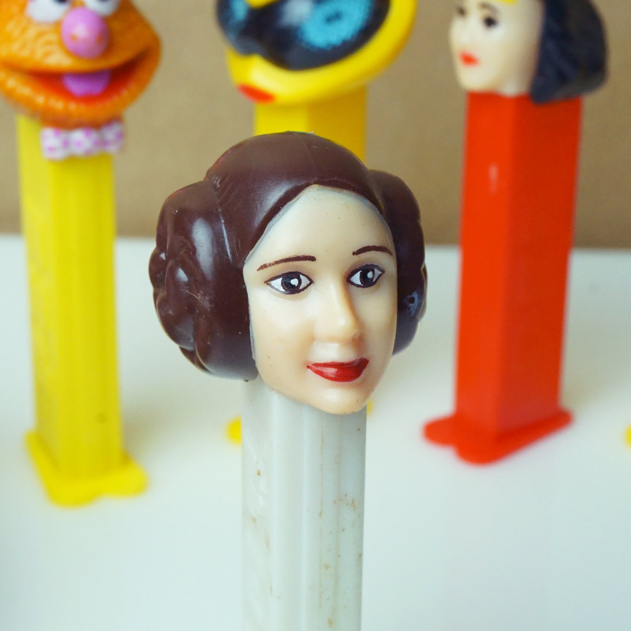 Set of (5) Vintage PEZ Dispensers: Fozzie, Leia, Bee, Wonder Woman, Bugs Bunny