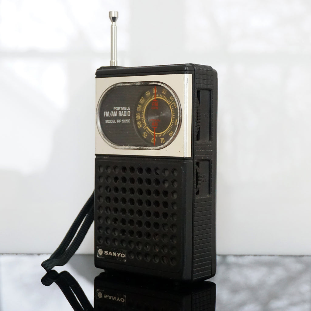 Vintage Sanyo Portable AM/FM Radio: Model RP 5050. Made in Hong Kong.