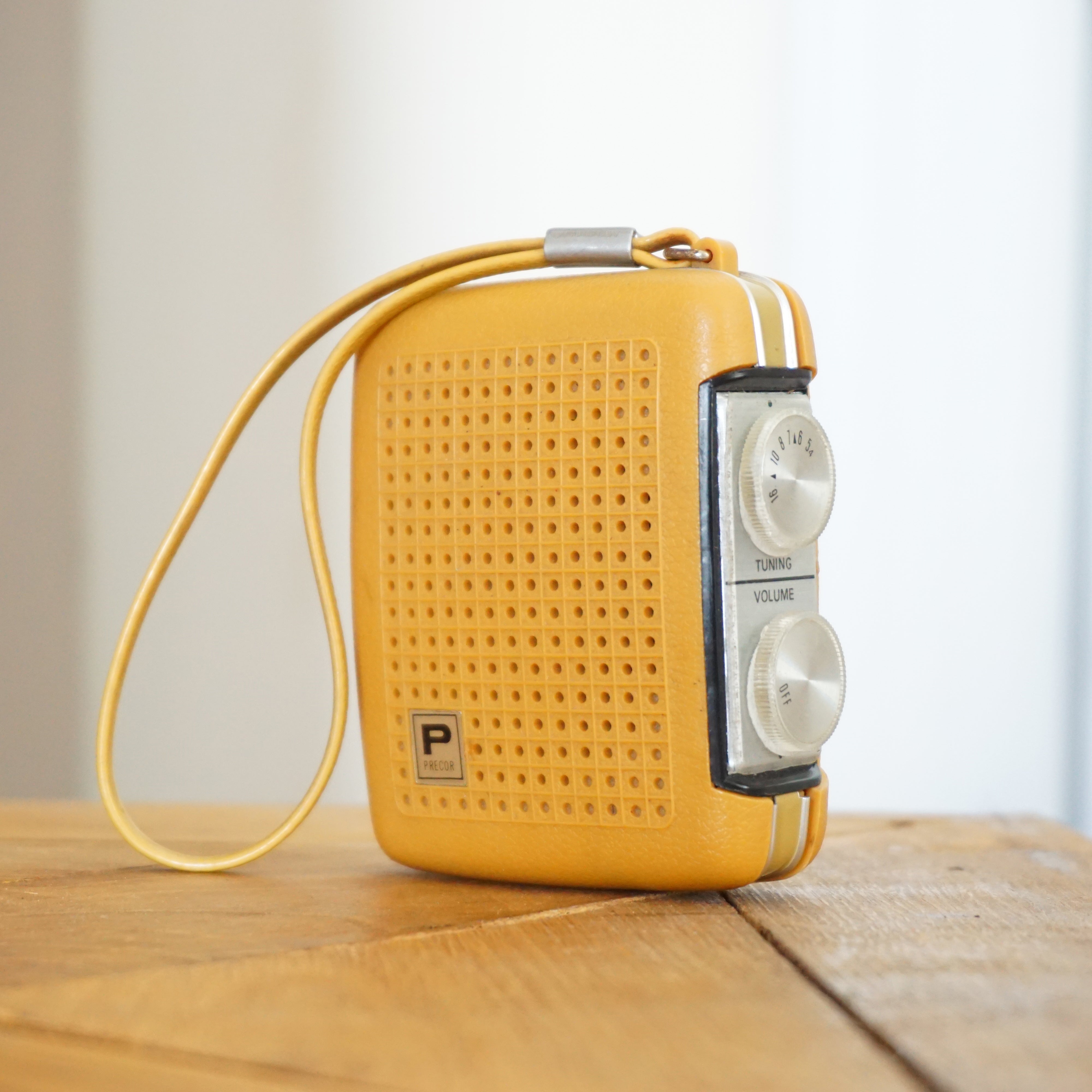 Mid Century PRECOR Pocket Mellow Yellow AM Radio. Works Well.