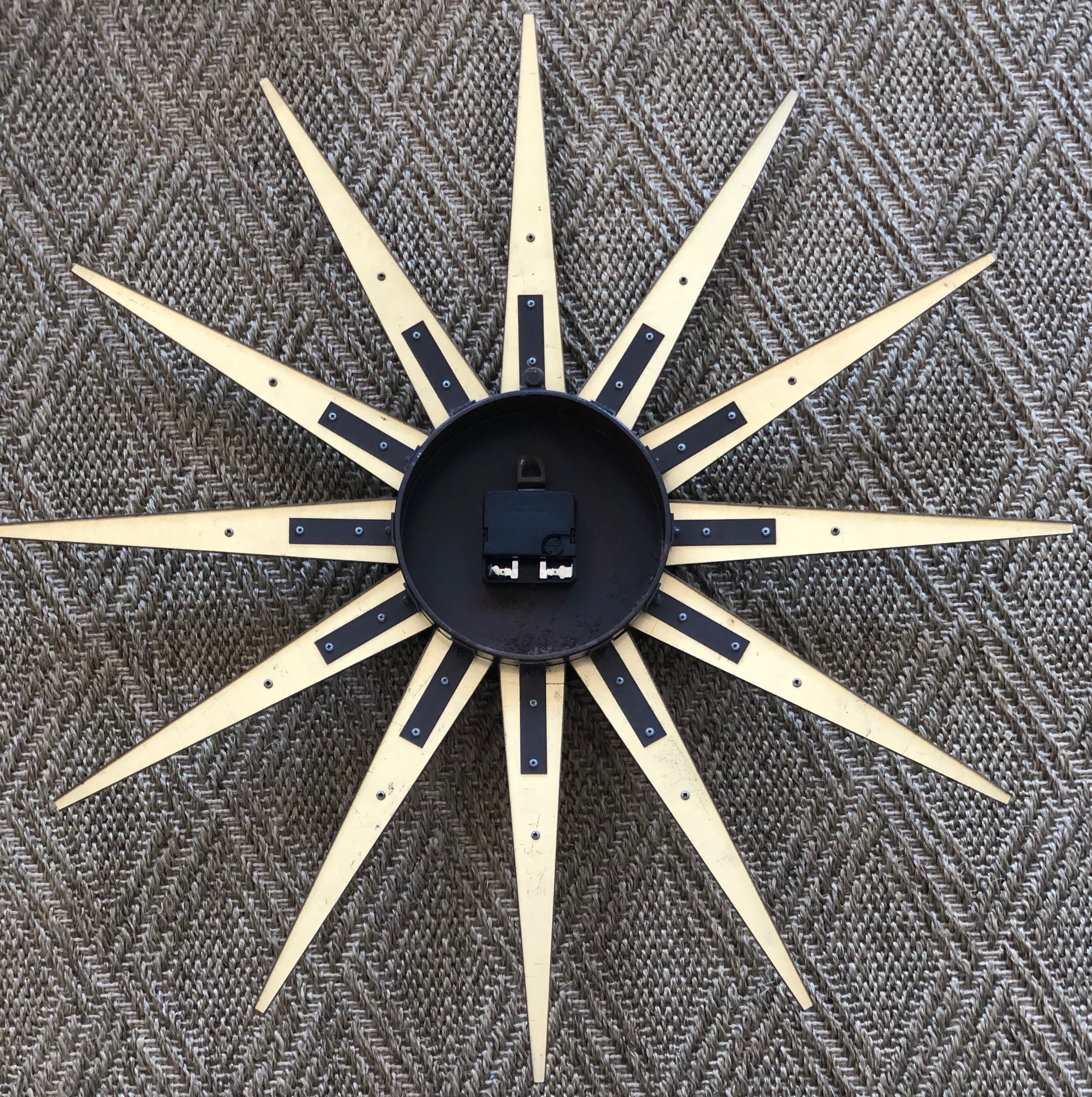 Mid-Century Starburst Wall Clock by Welby Division. Made in USA.